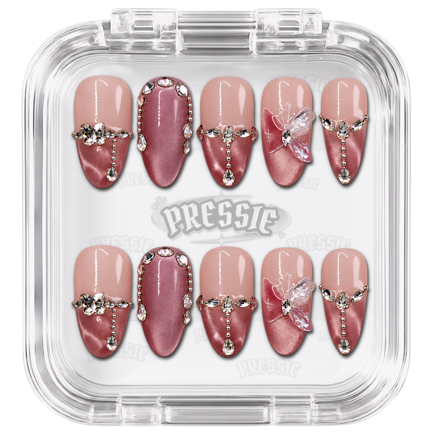 Faux ongles roses à bijoux argentés et petits motifs étoilés, présentés dans leur boîte Pressie Nails — Karla. @product