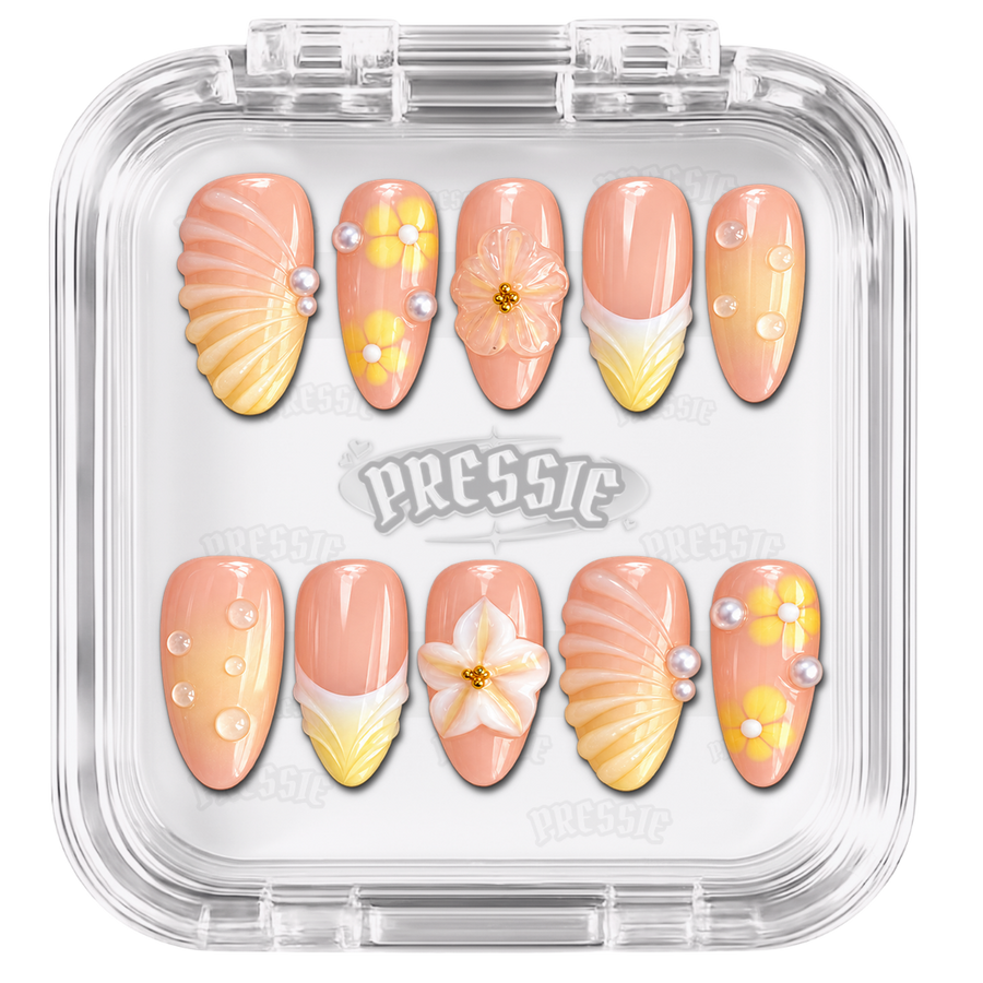 Faux ongles nude et jaune pastel à fleurs et perles, présentés dans leur boîte Pressie Nails — Beilei. @product