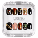 Faux ongles noirs et orange à bijoux et motifs argentés, présentés dans leur boîte Pressie Nails — Darkin. @product